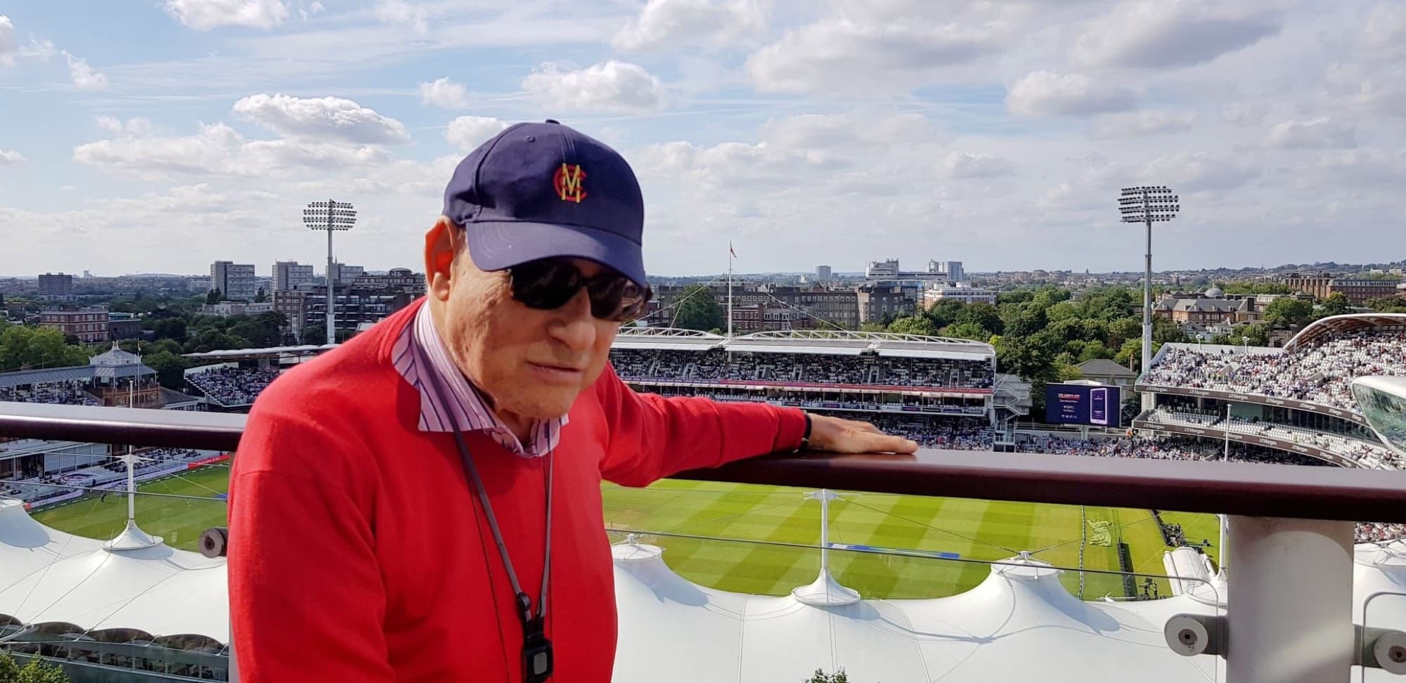 Laurence Silman overlooking Lord's Cricket Ground from his penthouse at Lord's View Two, St John's Wood